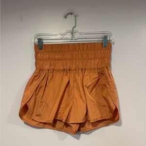 Free people movement orange flowy‎ shorts